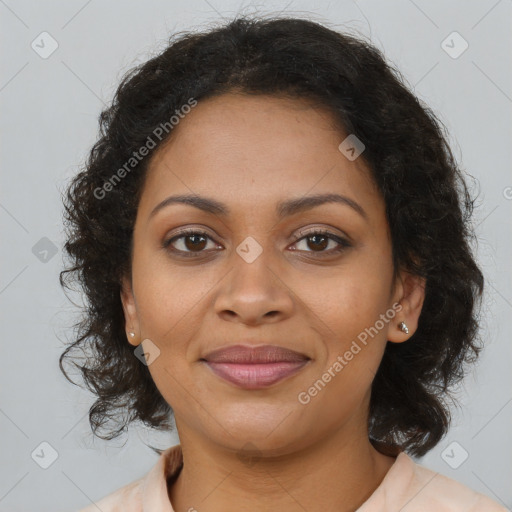 Joyful black young-adult female with long  brown hair and brown eyes