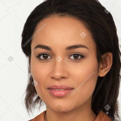 Joyful latino young-adult female with medium  brown hair and brown eyes