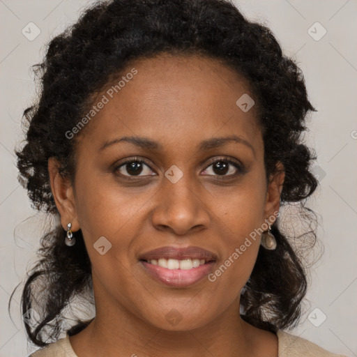 Joyful black young-adult female with medium  brown hair and brown eyes