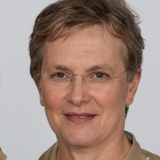 Joyful white middle-aged female with short  brown hair and brown eyes