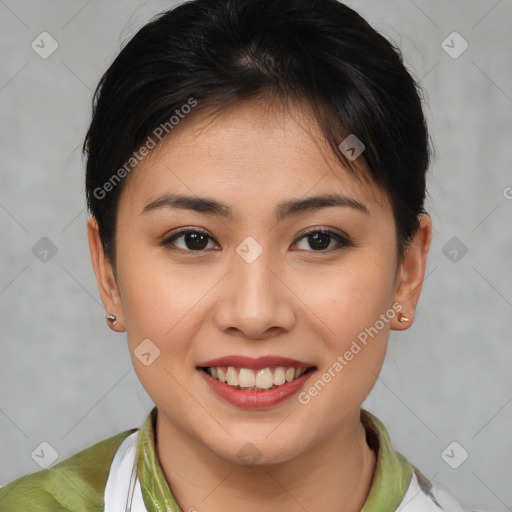 Joyful latino young-adult female with short  brown hair and brown eyes