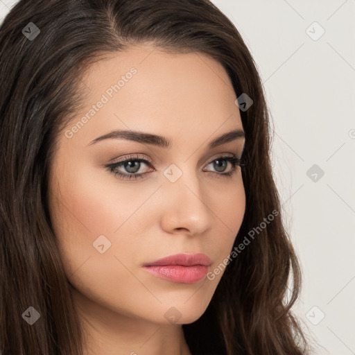 Neutral white young-adult female with long  brown hair and brown eyes