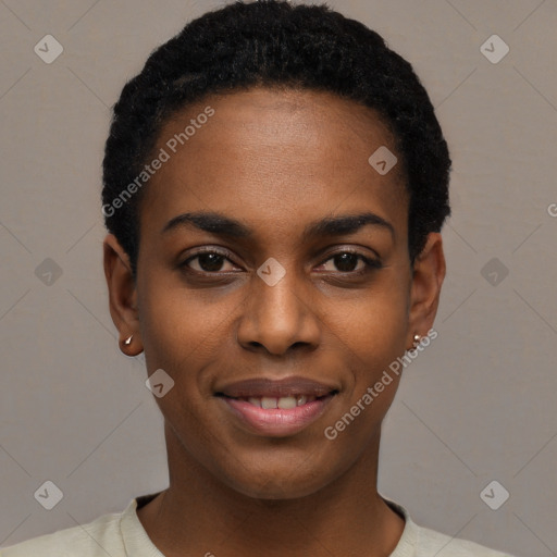 Joyful black young-adult female with short  black hair and brown eyes