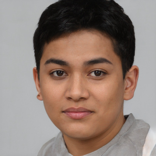 Joyful asian young-adult female with short  black hair and brown eyes