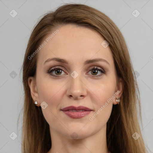 Joyful white adult female with long  brown hair and brown eyes