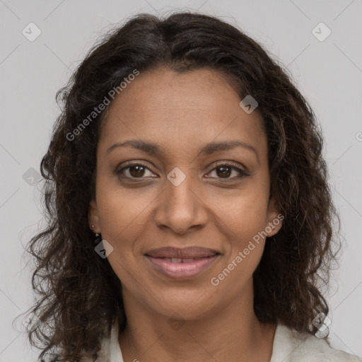 Joyful black young-adult female with medium  brown hair and brown eyes