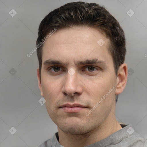 Neutral white young-adult male with short  brown hair and grey eyes