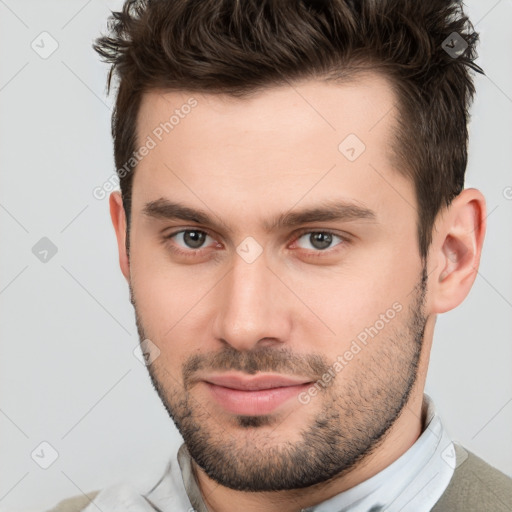 Neutral white young-adult male with short  brown hair and brown eyes