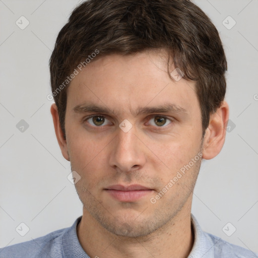 Neutral white young-adult male with short  brown hair and grey eyes