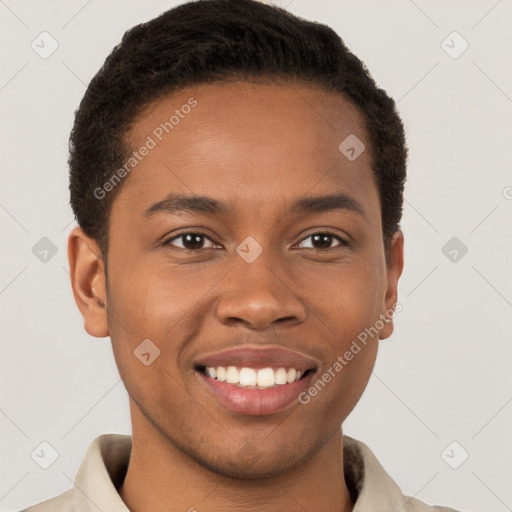 Joyful black young-adult male with short  brown hair and brown eyes