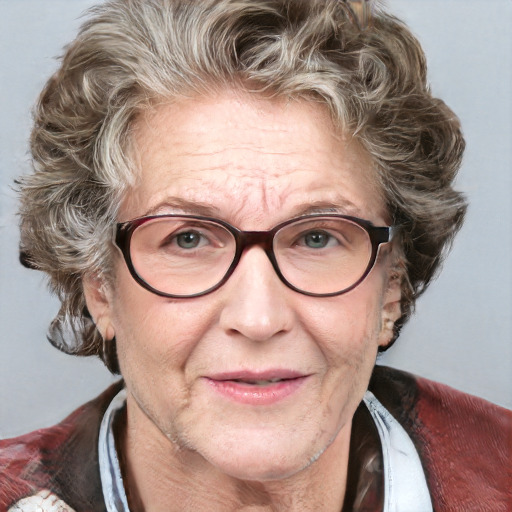 Joyful white middle-aged female with medium  brown hair and blue eyes