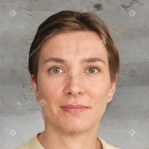 Joyful white adult female with short  brown hair and grey eyes