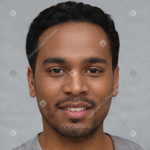 Joyful latino young-adult male with short  black hair and brown eyes