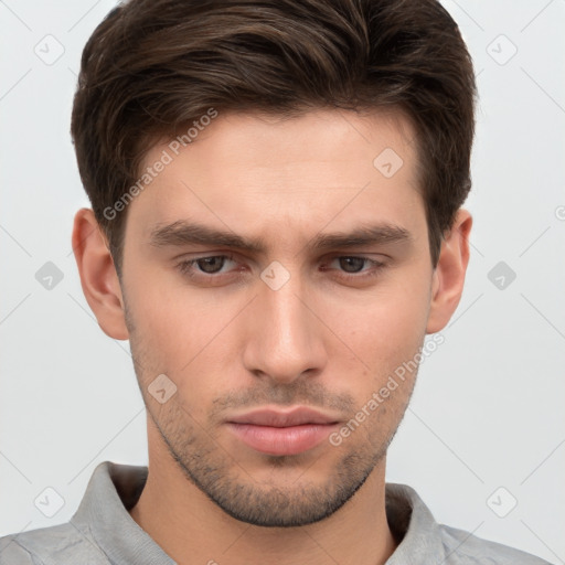 Neutral white young-adult male with short  brown hair and brown eyes