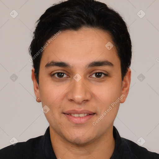 Joyful white young-adult male with short  black hair and brown eyes