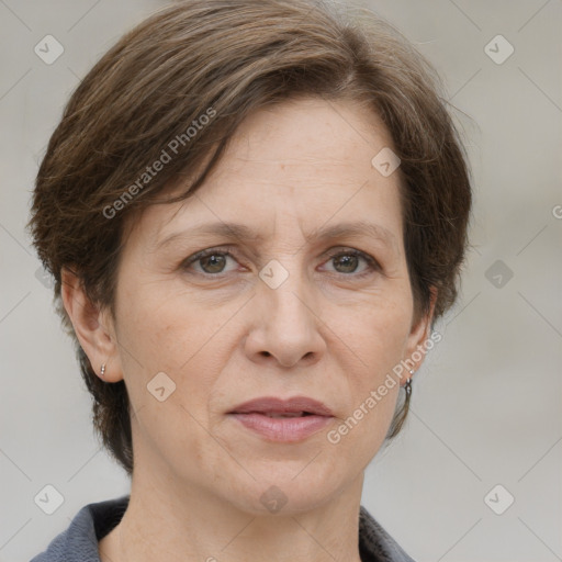 Joyful white adult female with short  brown hair and grey eyes