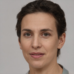 Joyful white adult female with short  brown hair and brown eyes