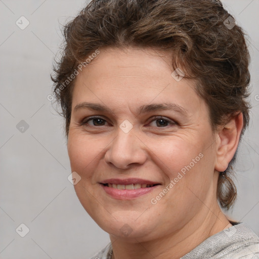 Joyful white adult female with short  brown hair and brown eyes