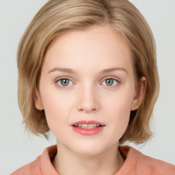 Neutral white child female with medium  brown hair and blue eyes