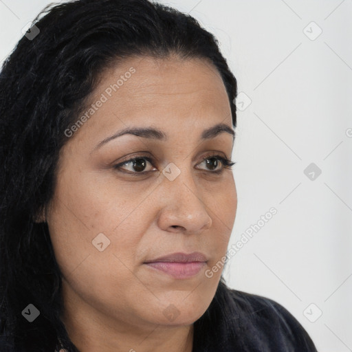 Joyful latino young-adult female with long  black hair and brown eyes