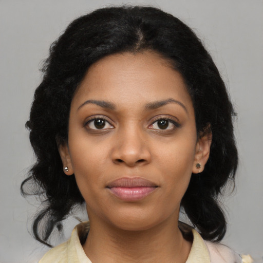 Joyful asian young-adult female with medium  black hair and brown eyes
