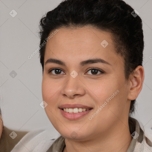 Joyful latino young-adult female with short  brown hair and brown eyes