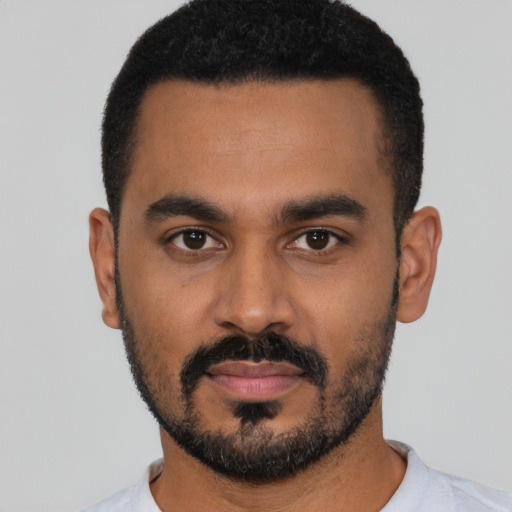 Neutral black young-adult male with short  black hair and brown eyes