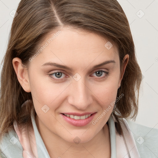 Joyful white young-adult female with medium  brown hair and blue eyes