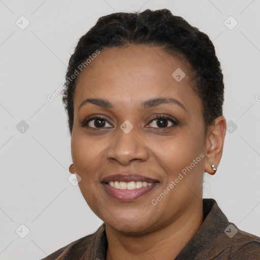 Joyful latino young-adult female with short  black hair and brown eyes