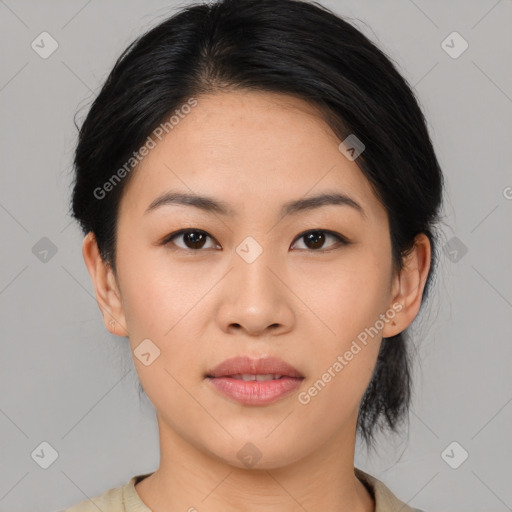 Joyful asian young-adult female with medium  black hair and brown eyes