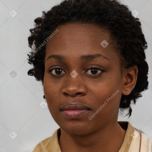 Neutral black young-adult female with medium  brown hair and brown eyes