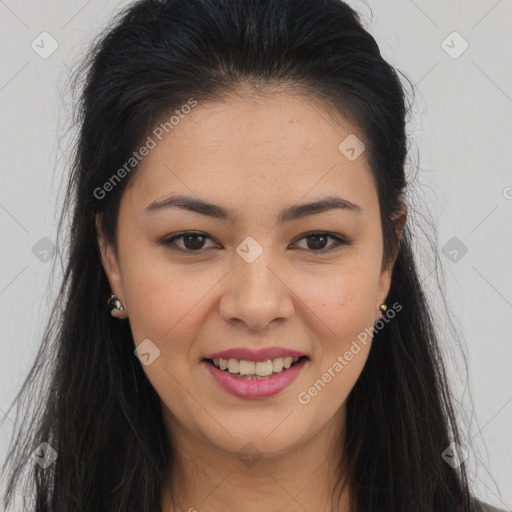 Joyful asian young-adult female with long  brown hair and brown eyes