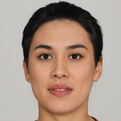 Joyful asian young-adult female with short  black hair and brown eyes