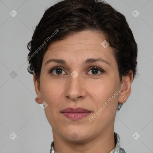 Joyful white adult female with short  brown hair and brown eyes