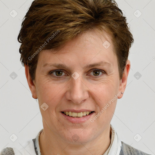 Joyful white adult female with short  brown hair and grey eyes