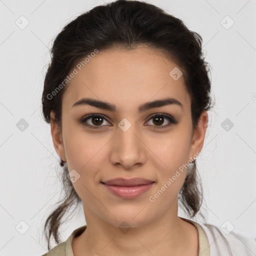 Joyful latino young-adult female with medium  brown hair and brown eyes