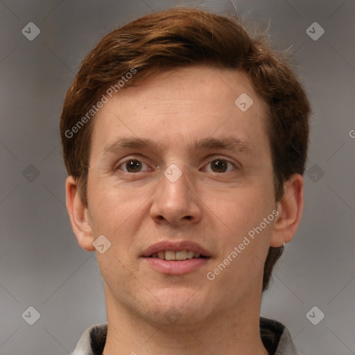 Joyful white adult male with short  brown hair and grey eyes