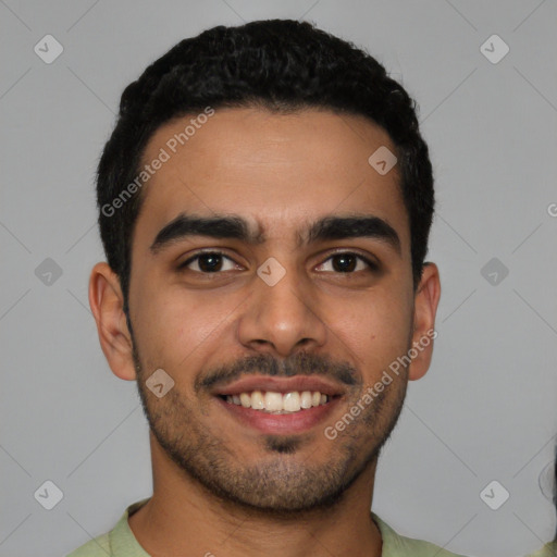 Joyful latino young-adult male with short  black hair and brown eyes