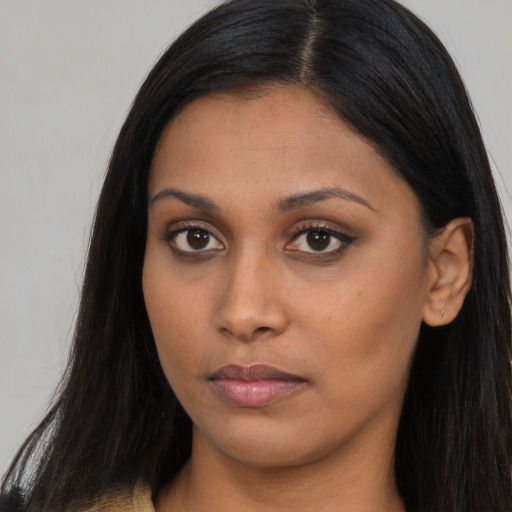 Neutral asian young-adult female with long  brown hair and brown eyes