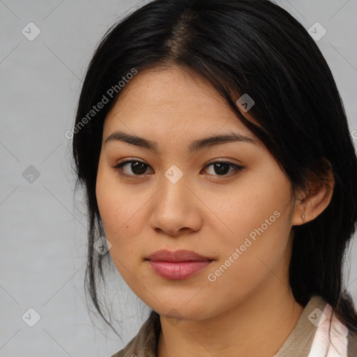 Joyful asian young-adult female with medium  black hair and brown eyes