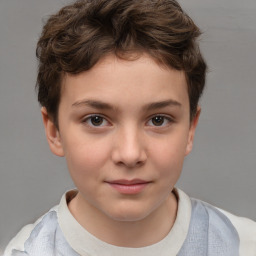 Joyful white child female with short  brown hair and brown eyes