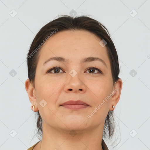 Joyful white adult female with medium  brown hair and brown eyes