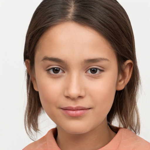 Joyful white child female with medium  brown hair and brown eyes