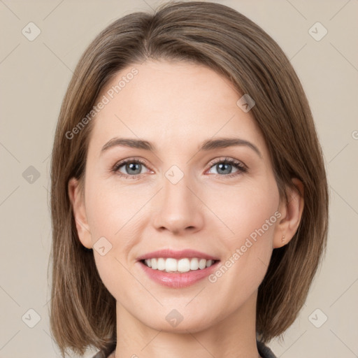 Joyful white young-adult female with medium  brown hair and green eyes