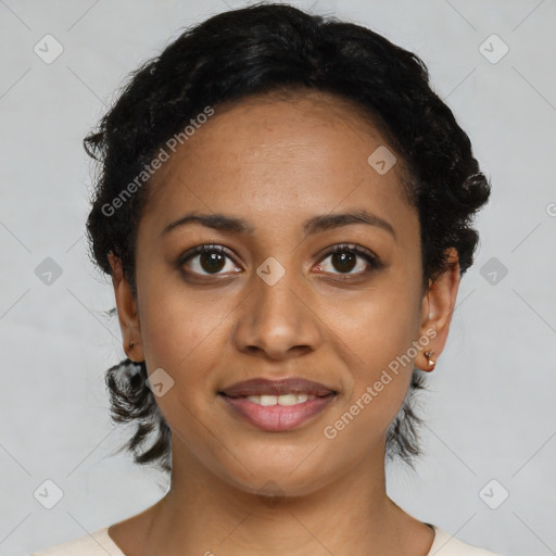 Joyful black young-adult female with short  black hair and brown eyes