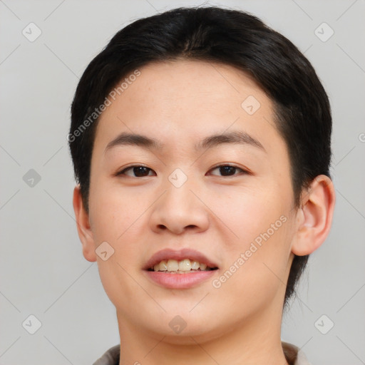 Joyful asian young-adult female with short  black hair and brown eyes