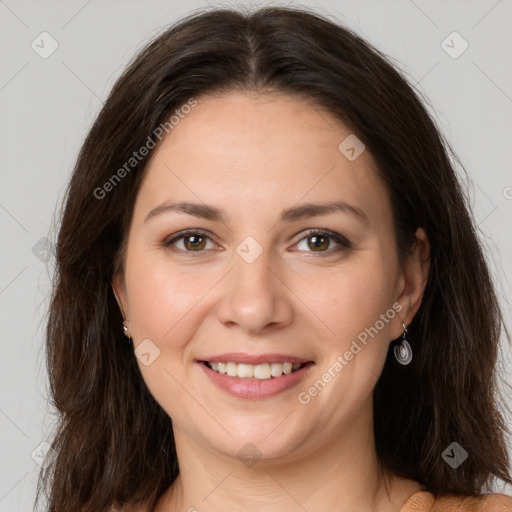 Joyful white young-adult female with long  brown hair and brown eyes