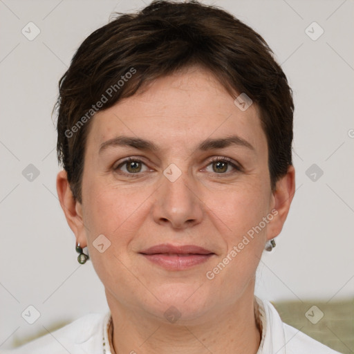 Joyful white adult female with short  brown hair and brown eyes