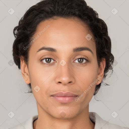 Joyful latino young-adult female with short  brown hair and brown eyes