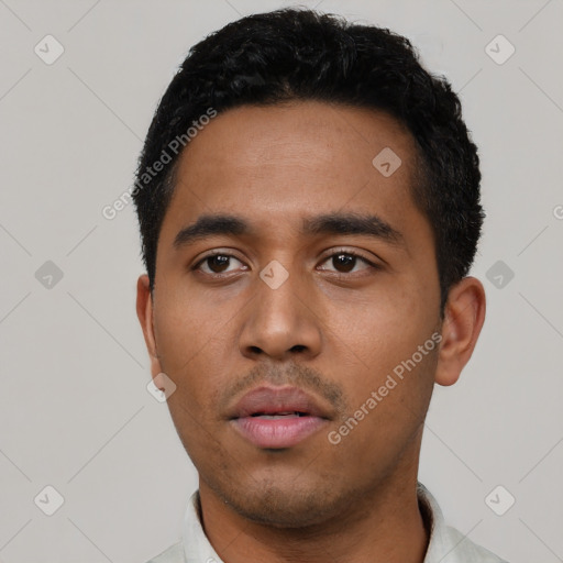 Neutral latino young-adult male with short  black hair and brown eyes